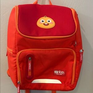 VIP kid.  Backpack orange